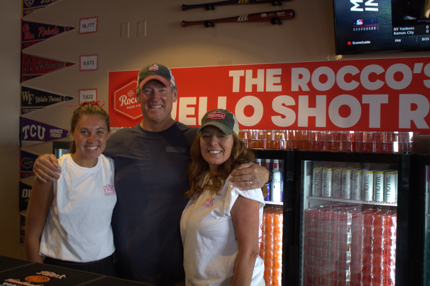 Rocco's Pizza and Cantina owner Kevin Culjat, center, with employee Abby Evers, left, and sister-in-law Leanne Maerz, right. (Photo by Brian Beach/Nebraska Public Media News)