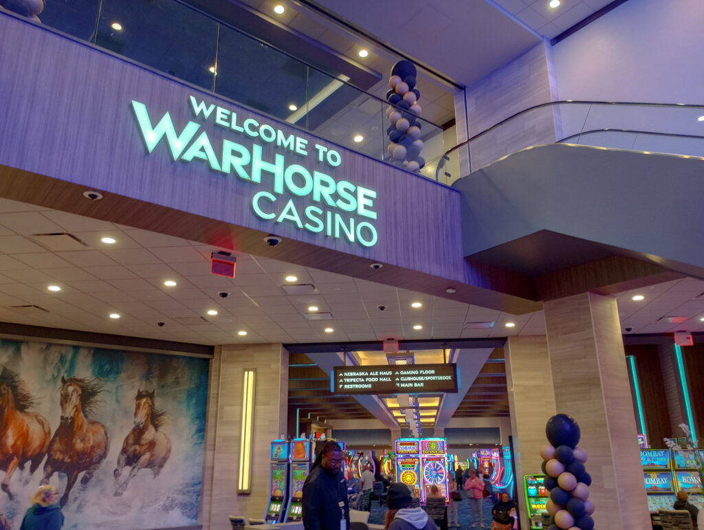 The new main entrance to Omaha's WildHorse Casino. The blue lighting gives the room an almost purple glow.