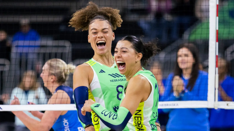 LOVB players celebrate during a game.