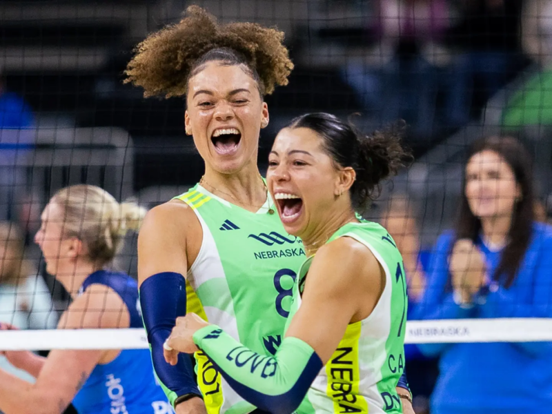LOVB players celebrate during a game.
