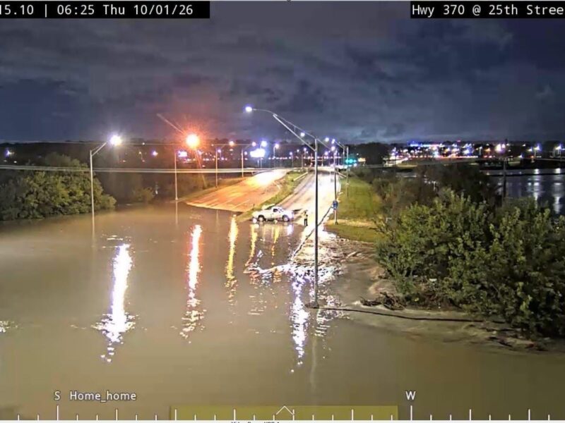 Water floods Highway 370 and 25th Street in Bellevue.