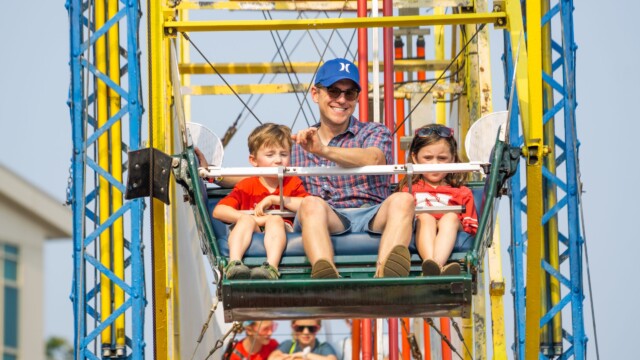 Maha Musical Festival attendees ride the ferris wheel on July 31, 2021. Photo by Chris Bowling.