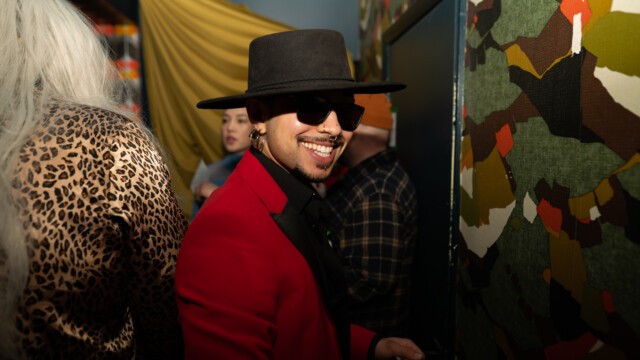 Drag performer Trade backstage at a drag benefit show at Tiny House Bar on April 15, 2023. Photo by Chris Bowling.