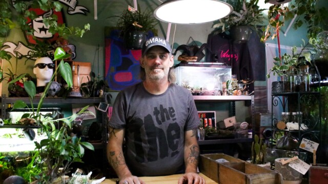 Tres Johnson, owner of (drips) botanical elements stands in the store’s new location. Photo by Sydney Johnson.